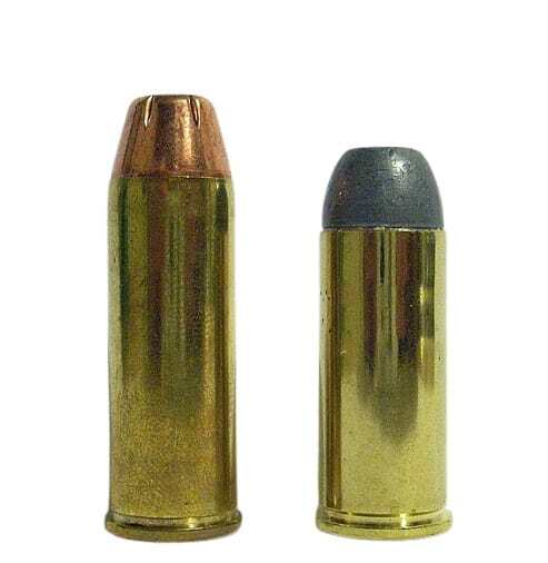 .45 Colt next to a .45 Schofield cartridge