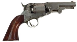 Vintage revolver firearm with wooden handle and metallic body, used for shooting and hunting purposes.