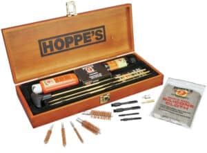 Hoppe's No. 9 Deluxe Gun Cleaning Kit in wooden presentation box with cleaning rods, brushes, and Hoppe's No. 9 solvent