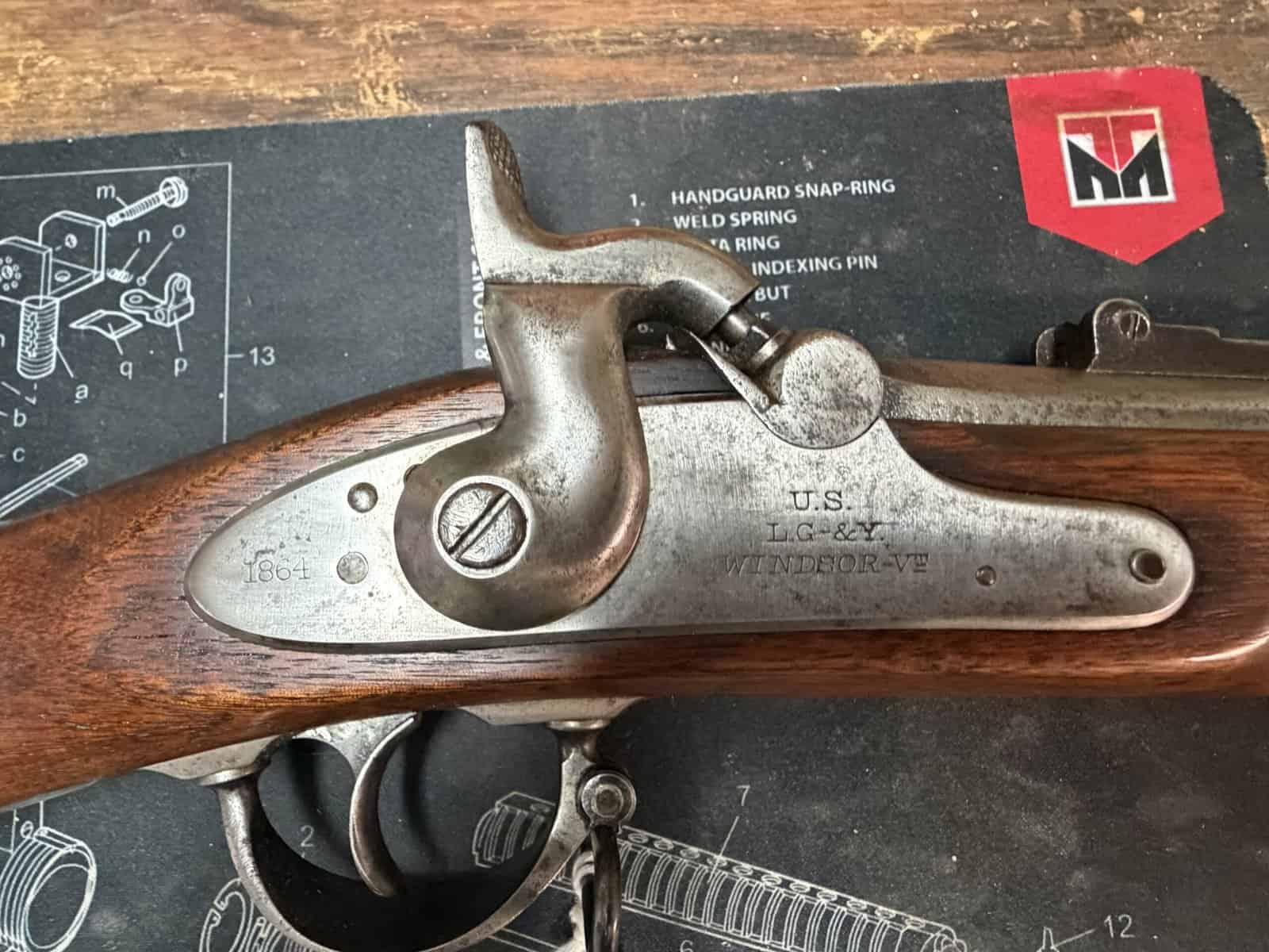 Lock plate detail of the Lamson, Goodnow & Yale Special Model 1861 showing U.S., L.G.&Y., and WINDSOR-VT markings with 1864 date