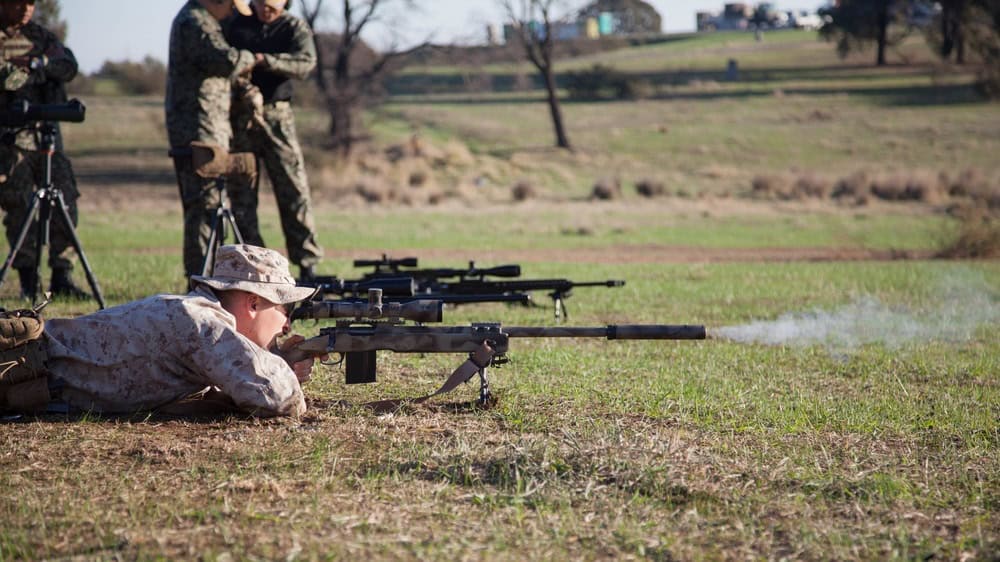 USMC shooter firing M40A5 Remington 700-based rifle at Australian Army shooting competition