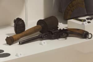 Imperial German WWI military equipment display including Reichsrevolver sidearm