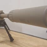 Suppressed precision rifle on a bipod — the NFA suppressor tax was eliminated in 2026