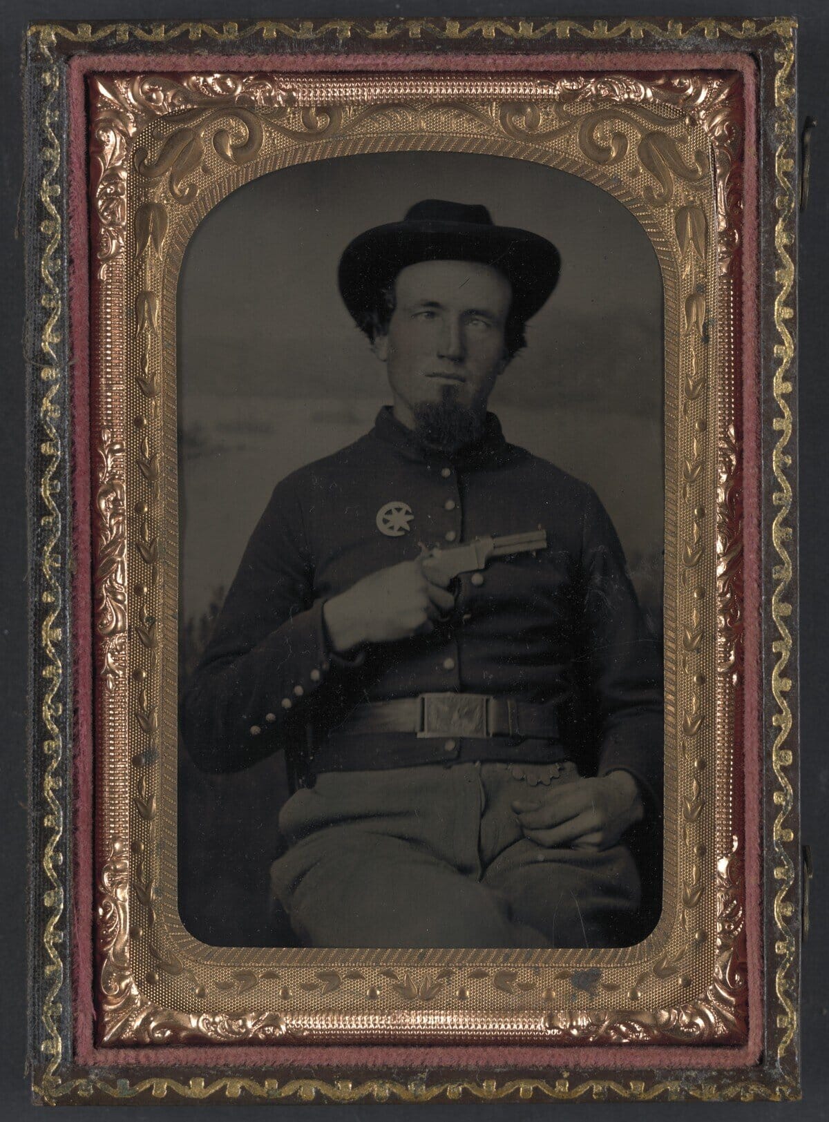 Unidentified Union soldier holding a Volcanic Repeating Arms pistol during the Civil War