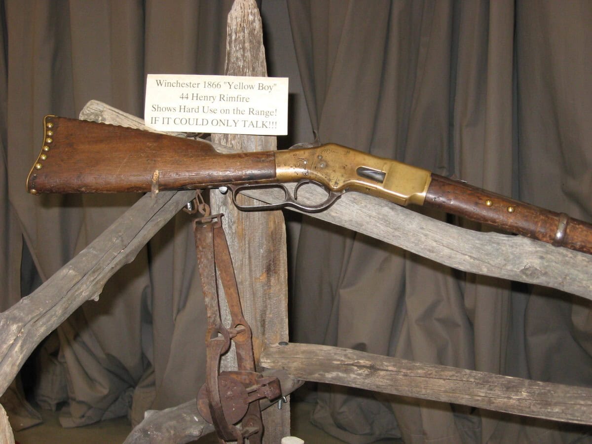 Winchester Model 1866 Yellow Boy lever-action rifle, a direct descendant of the Volcanic Repeating Arms pistol