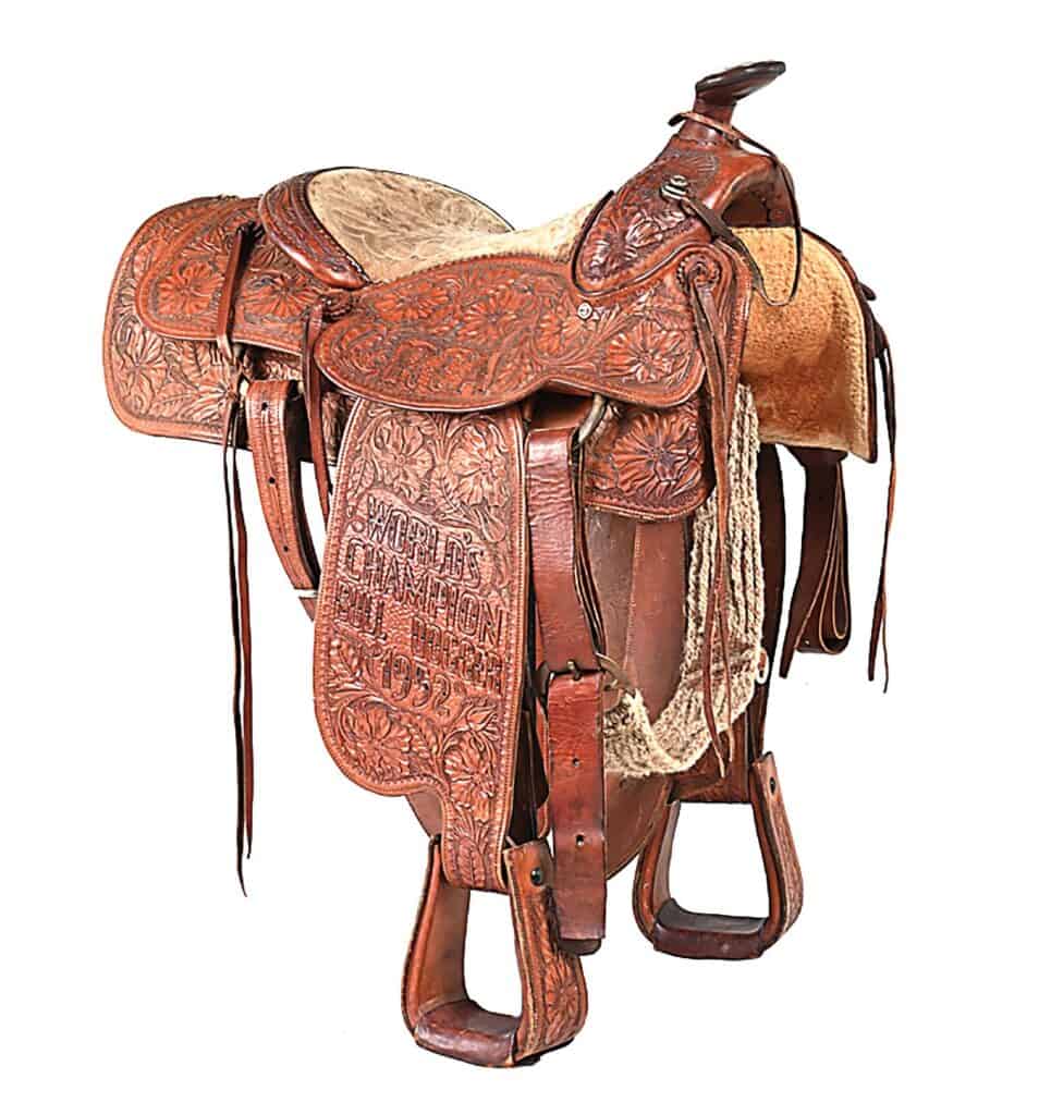 Circa-1952 Rowell Saddle Company tooled-leather saddle won by rodeo legend Harley May. Estimate $2,000–$3,000.