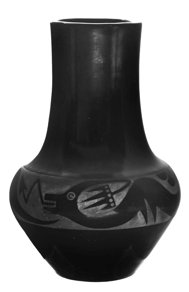 Mid-20th-century San Ildefonso blackware long-neck vase, a collaboration between Maria Martinez and Popovi Da. Estimate $12,000–$20,000.