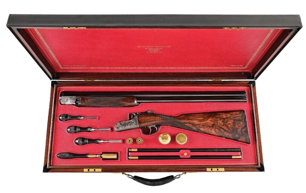 David McKay Brown 12 bore over/under shotgun with case