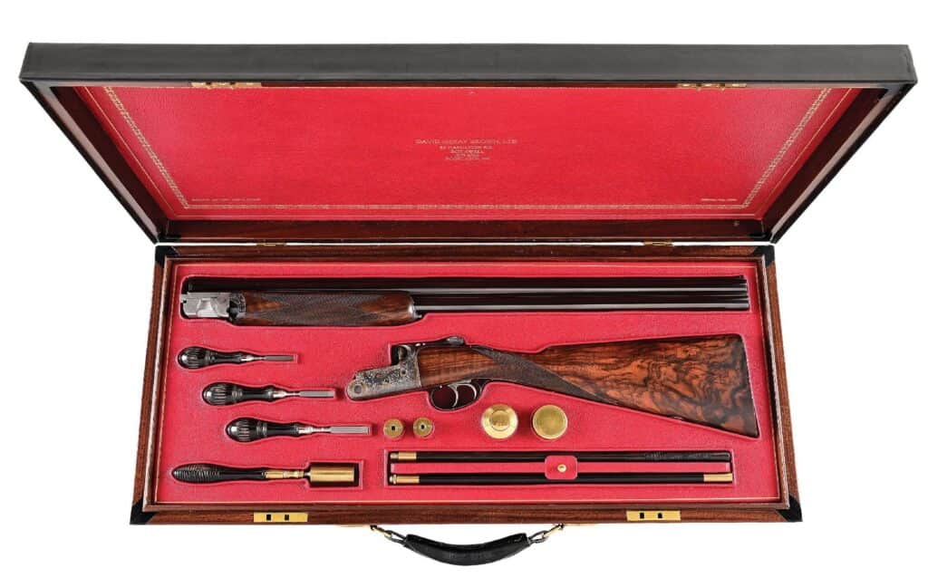 David McKay Brown 12 bore over/under shotgun with case
